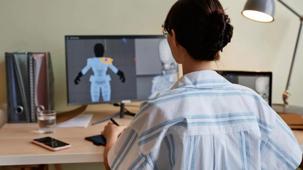 Mujer trabajando desde su computadora con animación 3D.